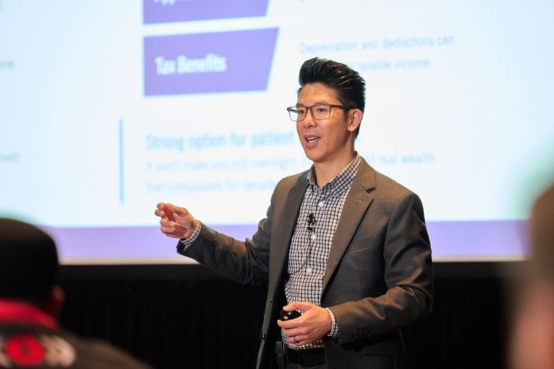 Donny C. Nguyen delivering a keynote on real estate investing