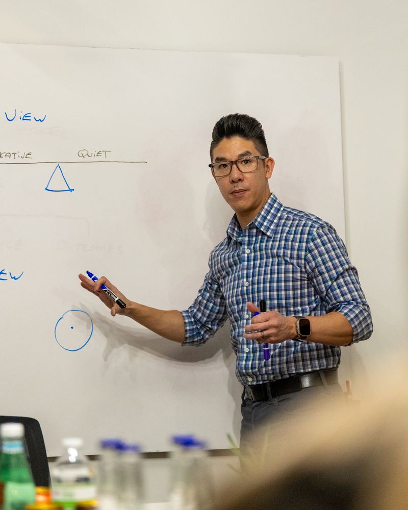 Donny C. Nguyen at a whiteboard